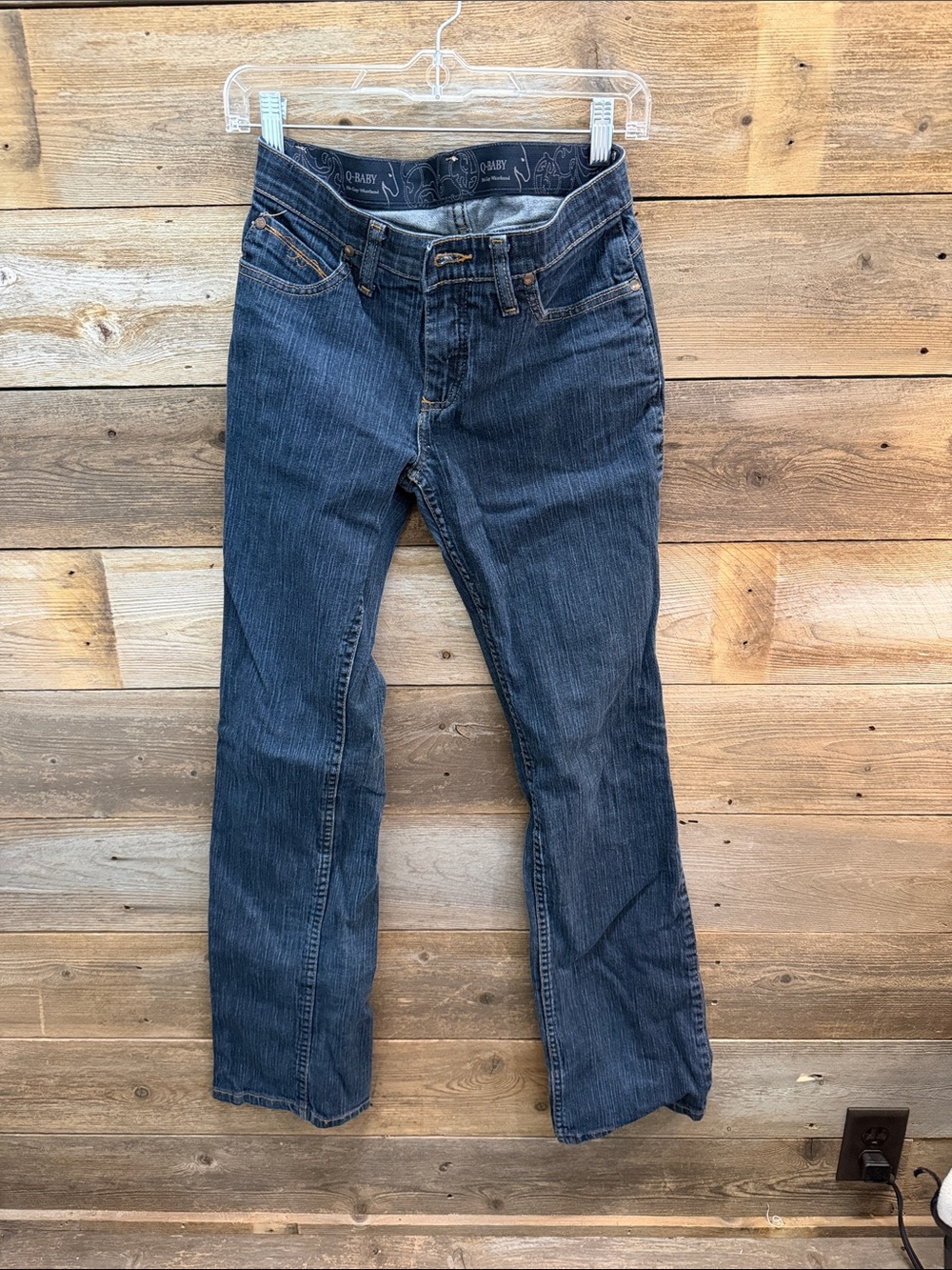 Women’s dark blue riding jeans